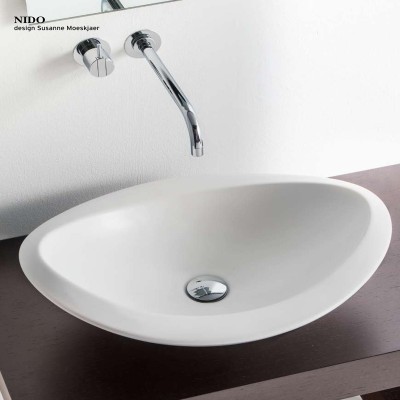 Umywalka nablatowa Rapsel Nido 62,5 cm biała ceramiczna